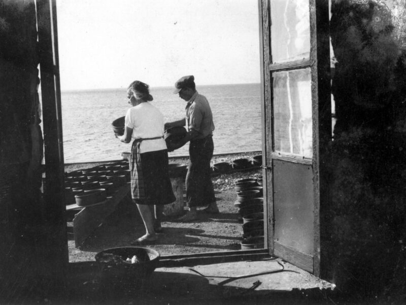 Alekos and Katina Prounias outside their Platys Gialos workshop, c. 1970.