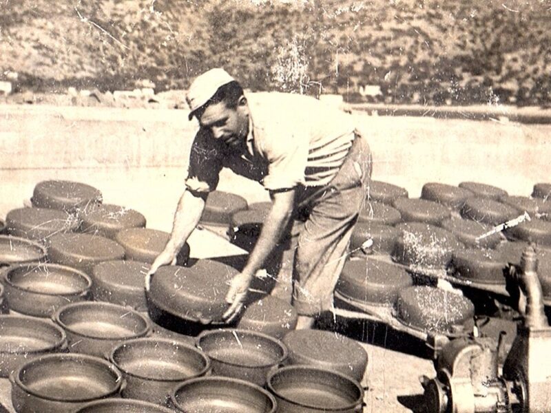 Giannis Atsonios drying cookware, c. 1965. Atsonios Pottery, Sifnos.