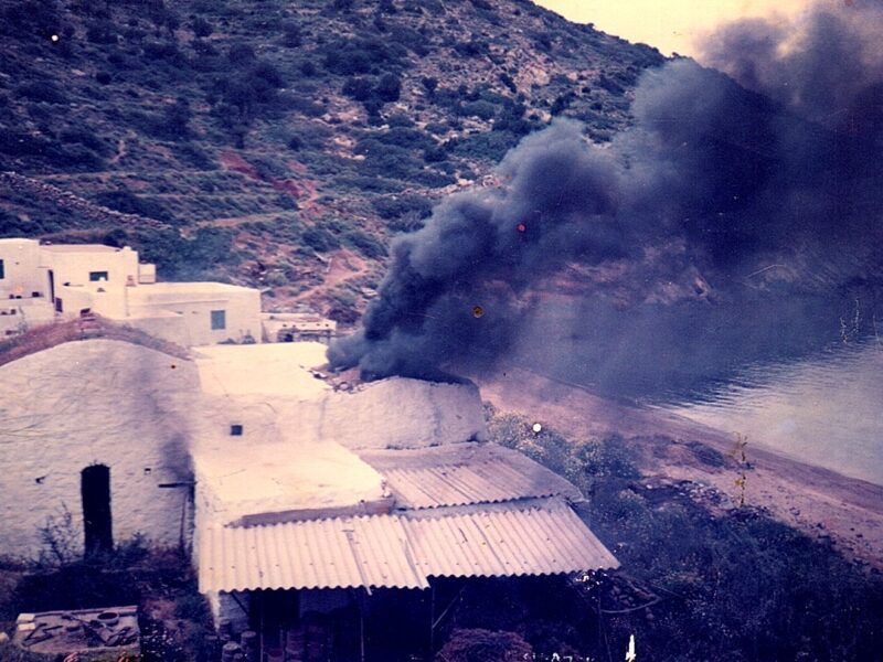 Wood firing of kiln in Vathy, c. 1985. Atsonios Pottery, Sifnos.