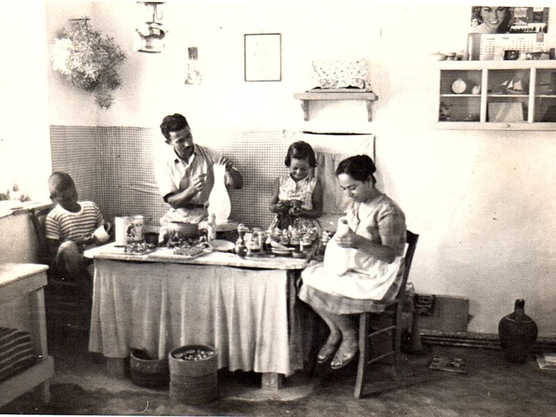 The Kalogirou family painting ceramics in their Kamares workshop, c. 1959.